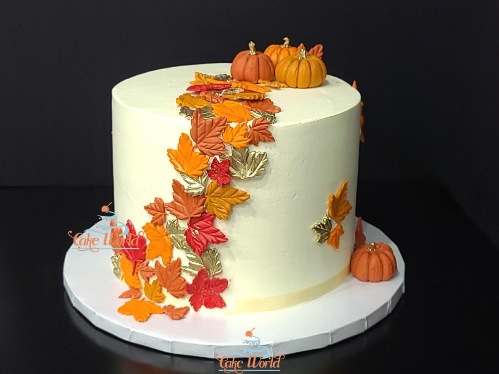 Autumn fall leaf and pumpkin cake 