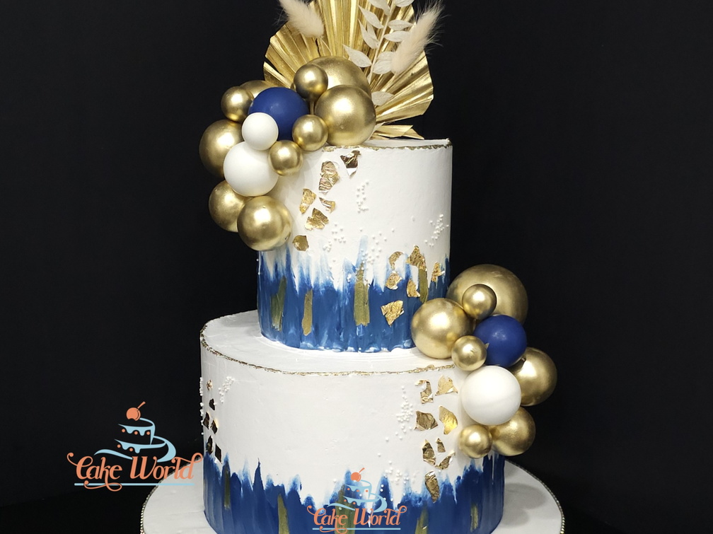 Blue and Gold Palm Spear Cake